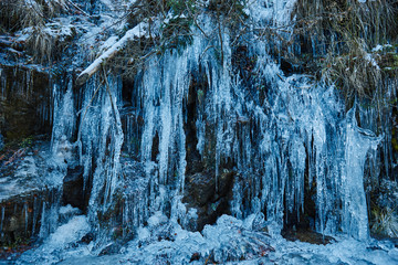 Icicles on mountain wall