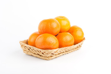 Orange ripe in basket on white background.