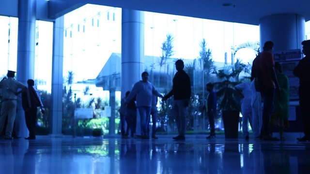 Silhouette of people at office