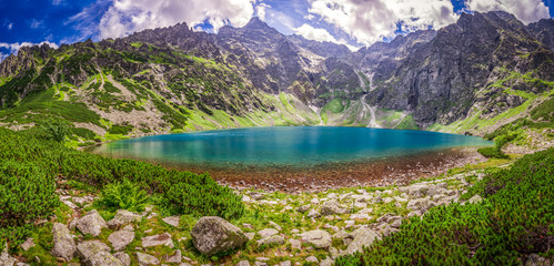 Panorama of wonderful lake in the Tatra Mountains at sunrise © shaiith