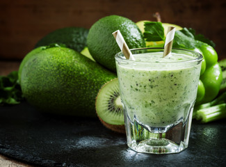Green detox smoothie with avocado, kiwi, celery, bell peppers