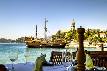 Fototapeta na wymiar Restaurant table on Sipan island, Croatia