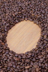 Coffee beans on the wooden table