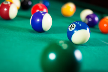 Billiard balls in a pool table