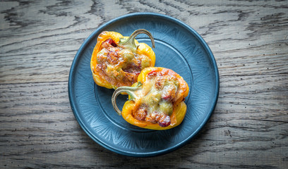 Stuffed peppers with sausages and mozzarella topping