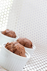 Chocolate muffins in classic ramekins
