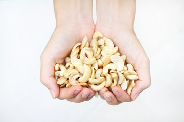 Obraz premium hands with nuts