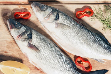 Raw fish on a cutting Board