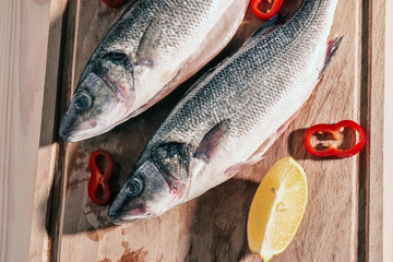 Raw fish on a cutting Board