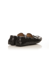 black men's shoes on a white background