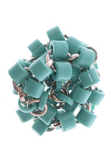 turquoise plastic beads on a white background