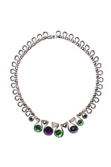 Silver necklace with colored gems on a white background