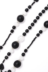 black and white  beads closeup  on a white background