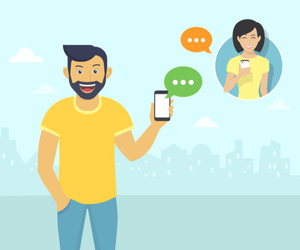 Happy guy is chatting with friends via messenger app