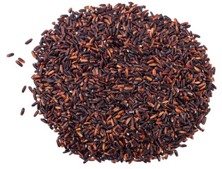 Grains of black rice on a white background
