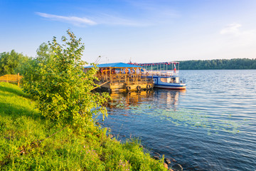 Fototapeta premium Shore of the Volga river in the morning sun.