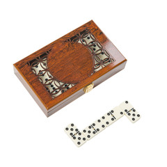 wooden box of dominoes on a white background