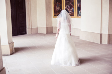 bride decides whether to enter the door