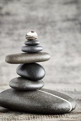 Massage stones put in the form of a pyramid.