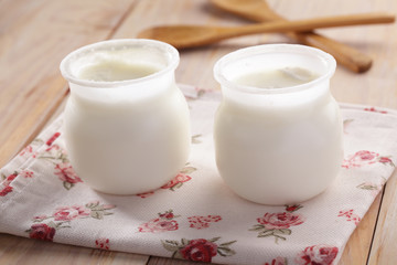 Two jars of yogurt