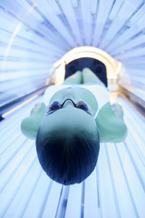 Cute young girl is acquiring a tan