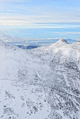 Clouds and sun in Kasprowy Wierch in Zakopane in Tatras in winter