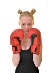 beautiful woman with the red boxing gloves, studio shot