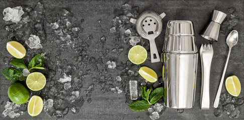Drink making tools. Ingredients for cocktail lime, mint, ice