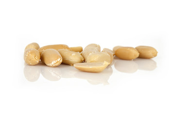 peanuts on a white background with shell