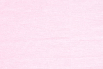 pink linen surface - close up of textile background - pastel ton