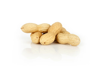 peanuts on a white background with shell