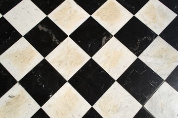 Black and white floor tiles checkered background