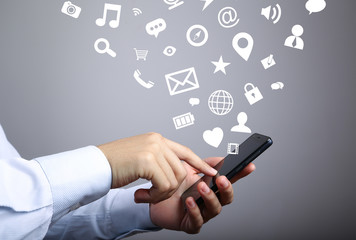 Businessman Use Smart Phone With Networking Icons