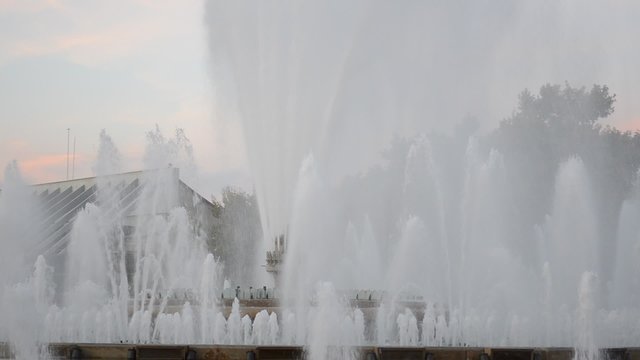 Singing Magic Fountain of Montjuic in the evening, Barcelona, Spain.