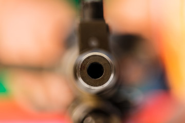 Gun point the submachine gun