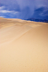 Thunderstorm over sand dunes
