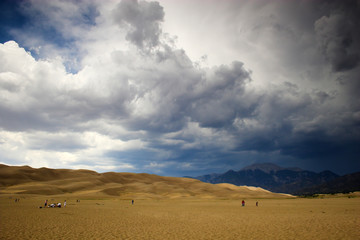Thunderstorm over sand dunes