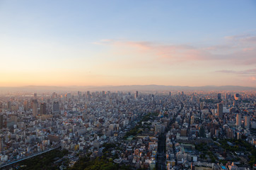 Obraz premium 夕日に照らされる大阪