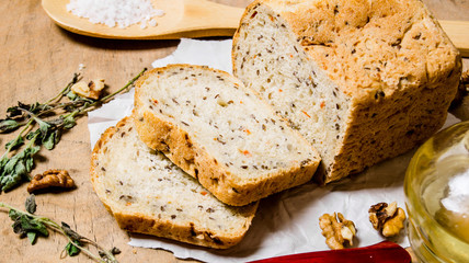 Fresh bread with oil , salt and herbs.