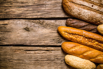 Bakery products on wooden background. Free space for text .