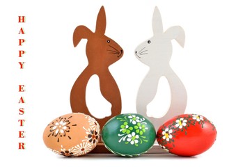 Easter bunny rabbit with decorated Easter eggs.