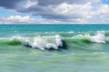 Fototapeta premium Storm waves on the sea shallows.