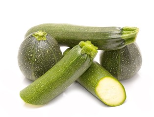 green zucchini vegetables isolated on white background