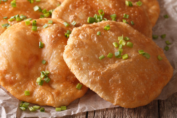 Indian Cuisine: Puri close-up on the table. Horizontal
