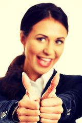 Businesswoman showing ok sign