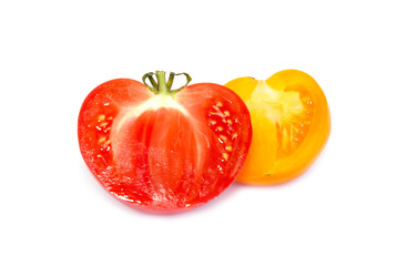 Two halves of fresh tomatoes isolated on white.