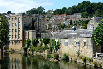 View of Bradford-on-Avon, Wiltshire, UK. A riverside view of the town alongside the River Avon
