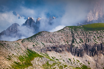 Foggy summer scene in the National Park Tre Cime De Lavaredo.