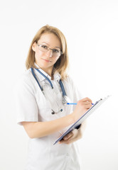 beautiful young female doctor in medical gown and rubber gloves holding a medical records. nurse making entries in medical records