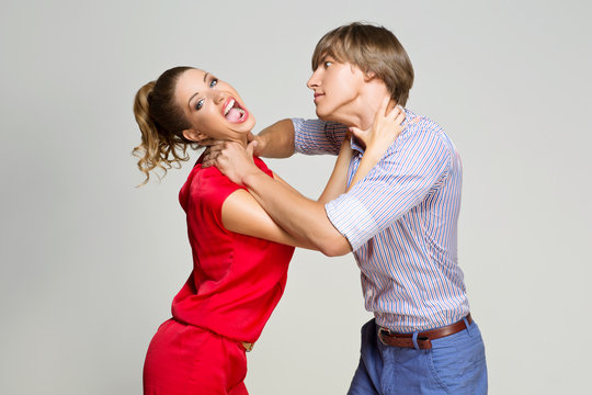 Couple strangling each other